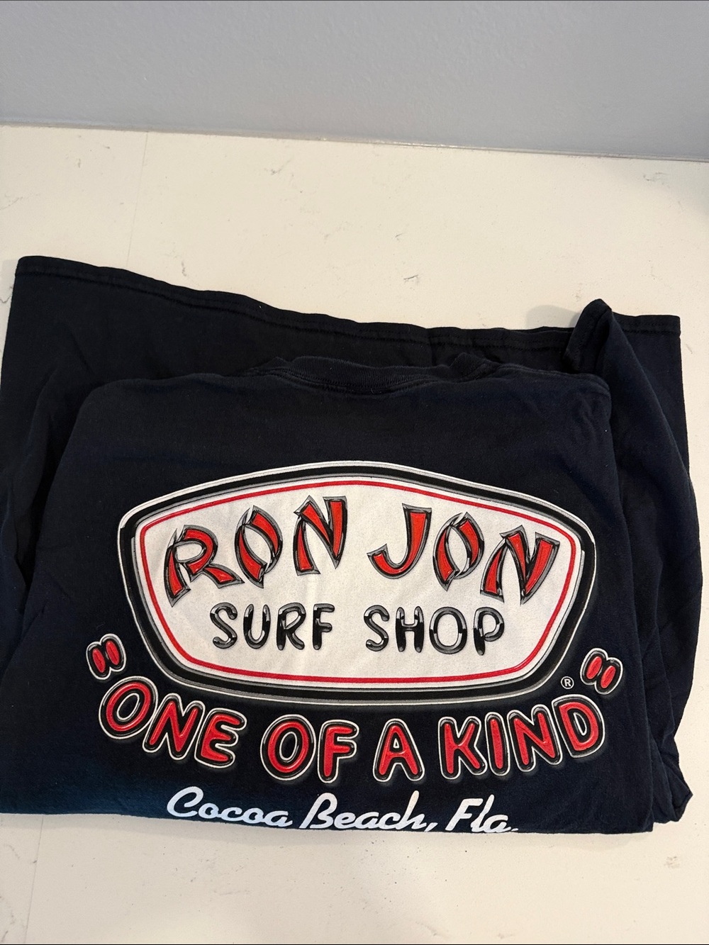 Ron Jon Black Tee with Red & Cream Surf Shop Logo